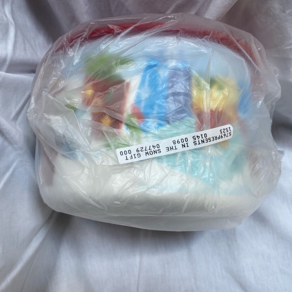 NWT Tupperware Presents in the Snow Container Canister. Approximately 7.5”x4.25”